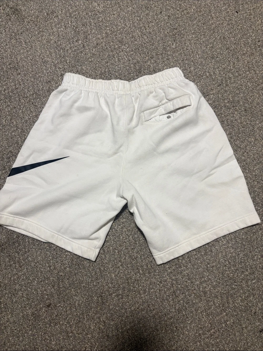 Nike White Athletic Shorts with Black Swoosh